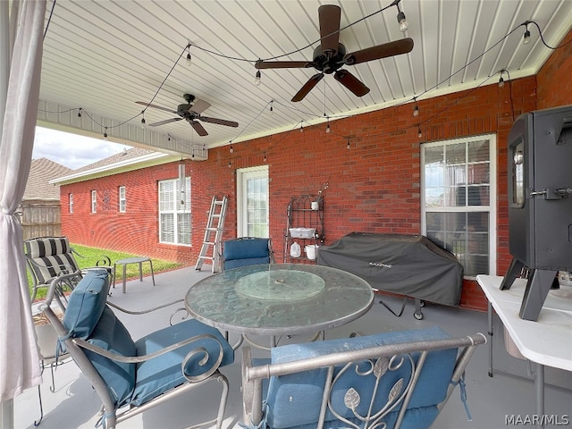 view of patio featuring grilling area and ceiling fan