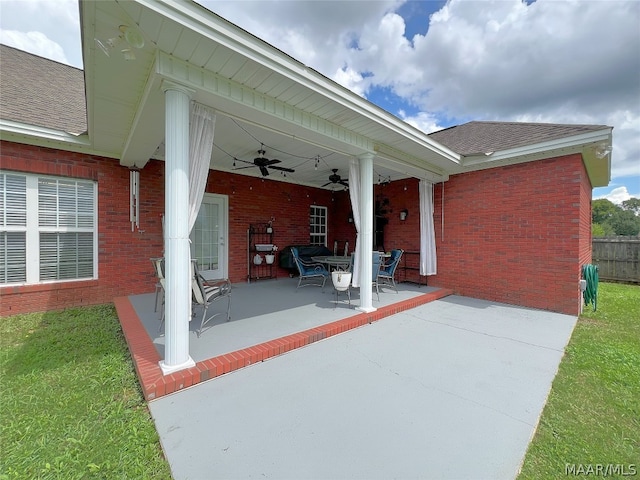 view of patio / terrace featuring ceiling fan