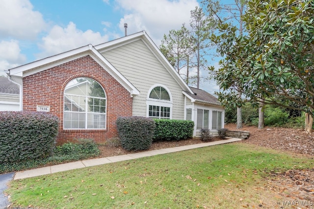 view of property exterior featuring a yard