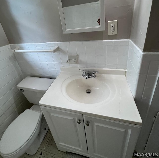 bathroom with tile patterned floors, decorative backsplash, and tile walls