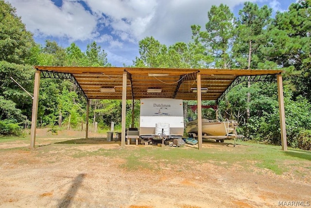 exterior space with a carport