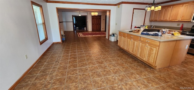 kitchen with a chandelier, light countertops, ornamental molding, and electric range