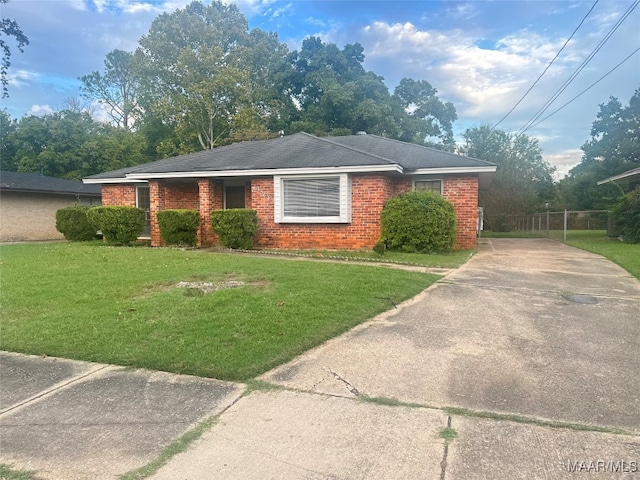 view of property exterior featuring a lawn