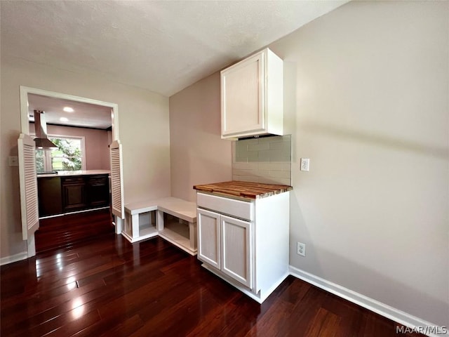 interior space featuring dark wood-type flooring