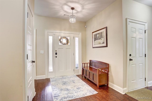 foyer featuring dark hardwood / wood-style floors