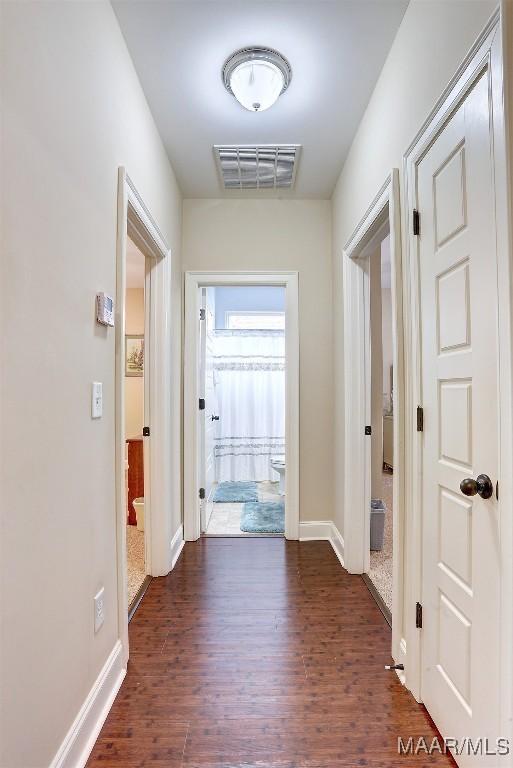 hall featuring dark hardwood / wood-style flooring