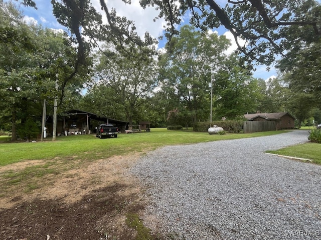 view of yard with a carport