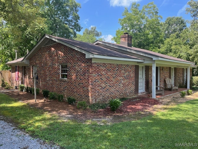 view of home's exterior featuring a lawn