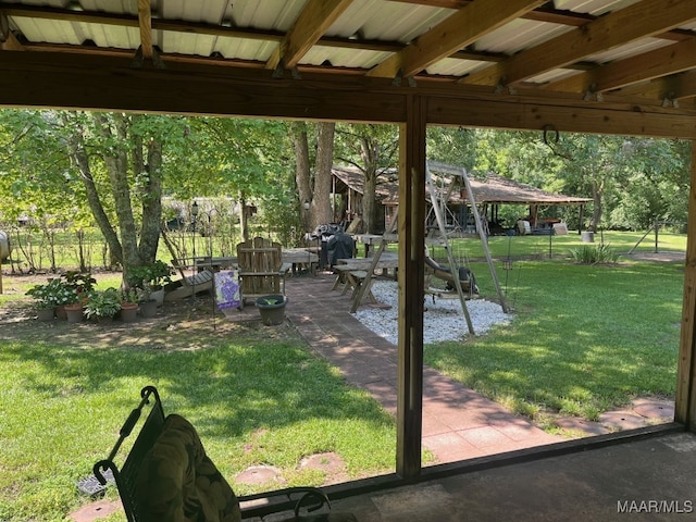 exterior space featuring a patio and a fire pit