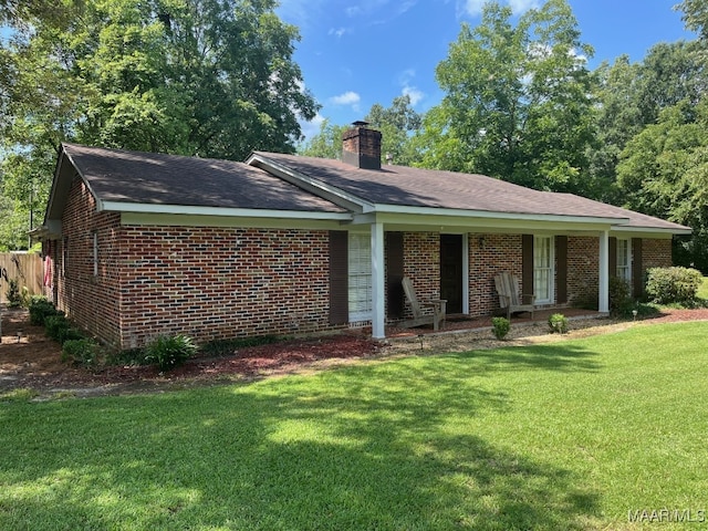 ranch-style home with a front yard