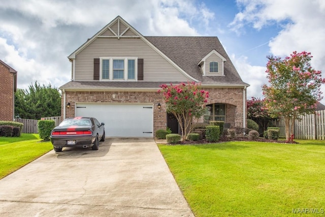 view of front of house with brick siding, a front lawn, fence, driveway, and an attached garage