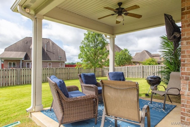 view of patio featuring ceiling fan and area for grilling