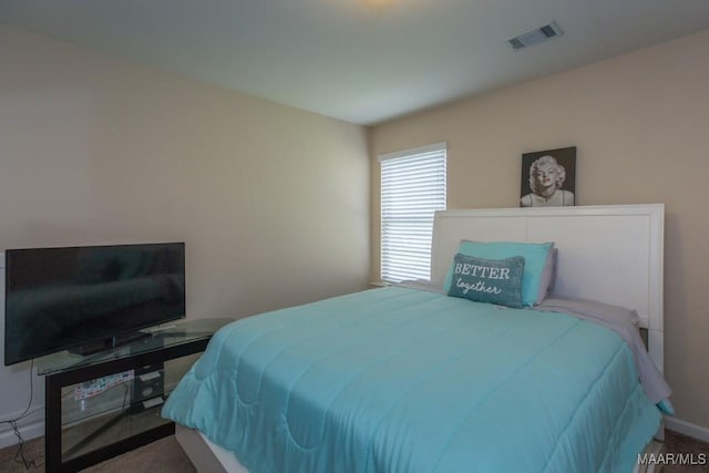 bedroom featuring carpet