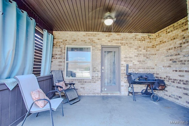 view of patio / terrace featuring ceiling fan