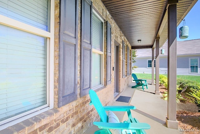 view of patio featuring a porch