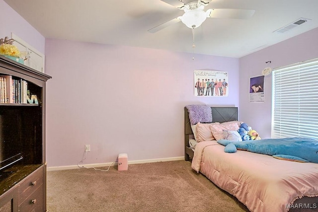 bedroom with ceiling fan and carpet flooring