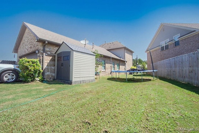 view of yard featuring a trampoline