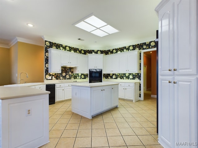 kitchen with light tile patterned flooring, white cabinetry, black appliances, decorative backsplash, and ornamental molding