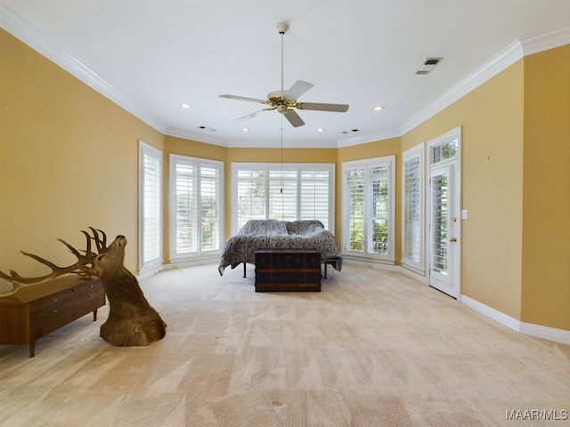 carpeted bedroom featuring crown molding, access to outside, multiple windows, and ceiling fan