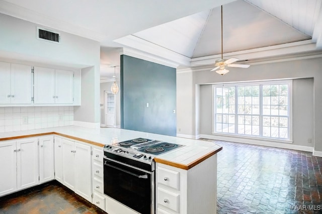 kitchen featuring white cabinetry, ceiling fan, white range oven, kitchen peninsula, and backsplash