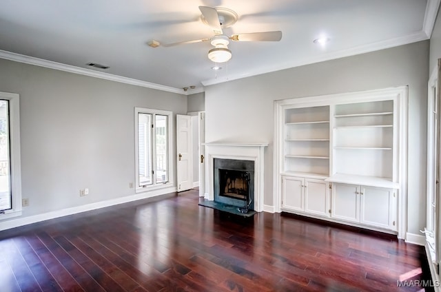 unfurnished living room with crown molding, ceiling fan, dark hardwood / wood-style floors, and a high end fireplace