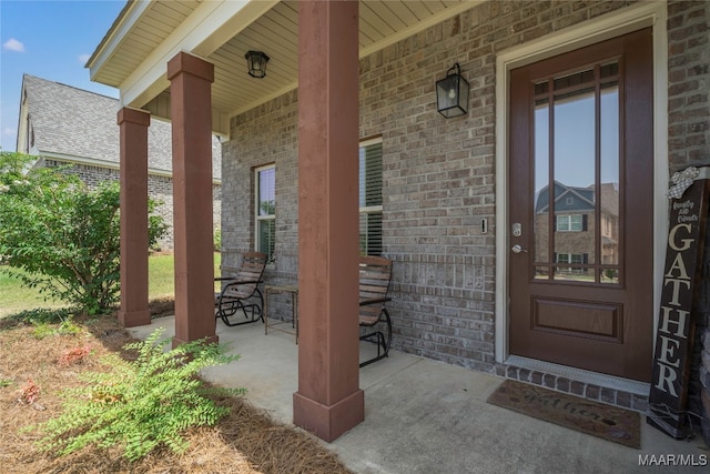 entrance to property with a porch