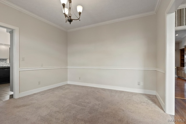 carpeted empty room with crown molding and a notable chandelier