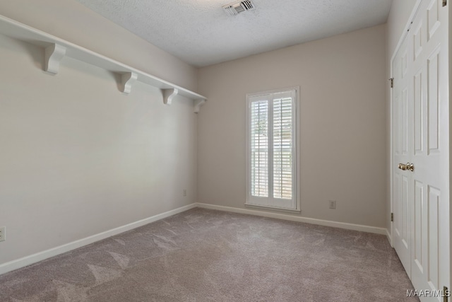 interior space with a textured ceiling