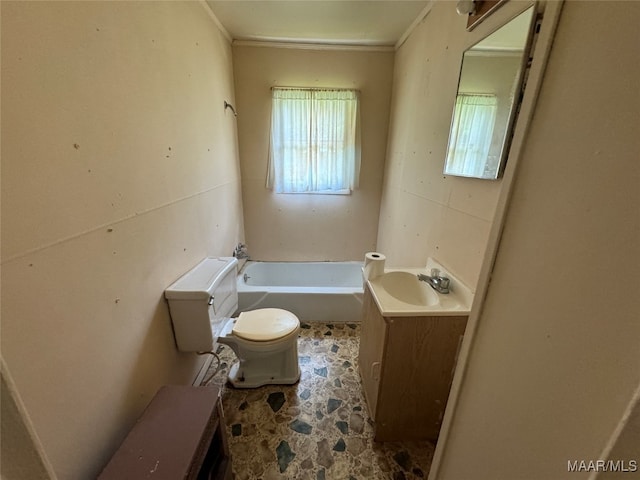 bathroom featuring a tub, vanity, and toilet