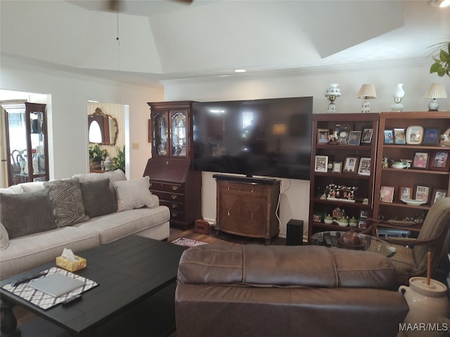 living room with dark hardwood / wood-style floors and ornamental molding