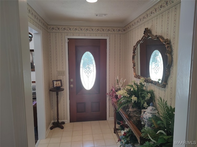 view of tiled foyer entrance