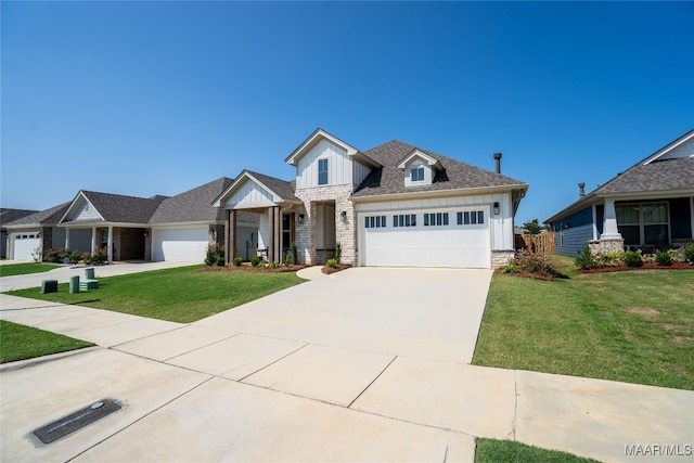 view of front facade featuring a garage and a front lawn