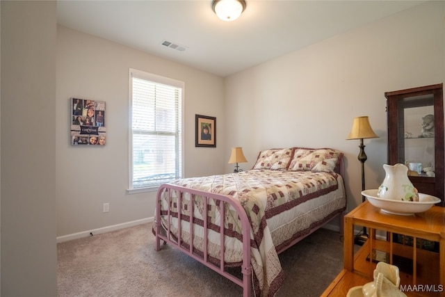 bedroom featuring carpet