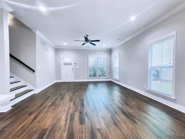 unfurnished living room featuring ornamental molding, dark hardwood / wood-style floors, and ceiling fan