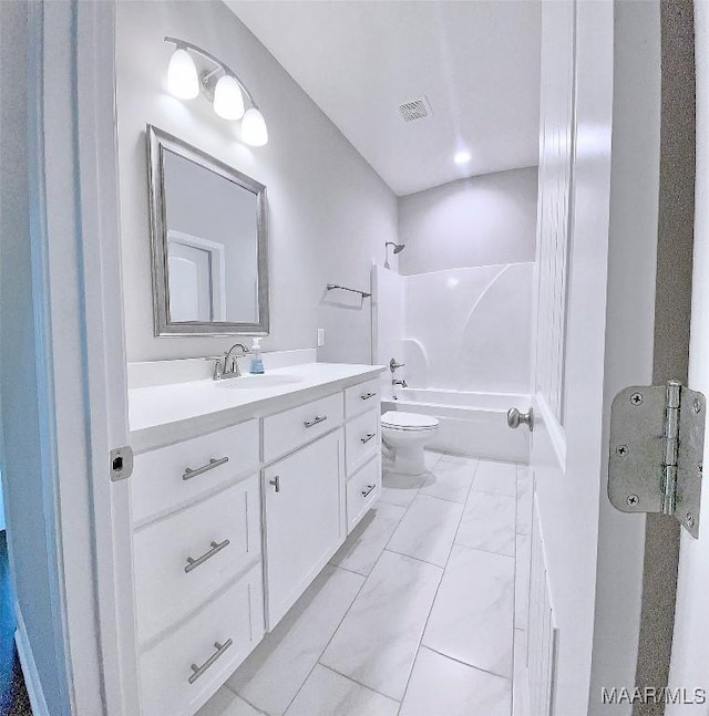 full bathroom featuring vanity, shower / bathing tub combination, and toilet