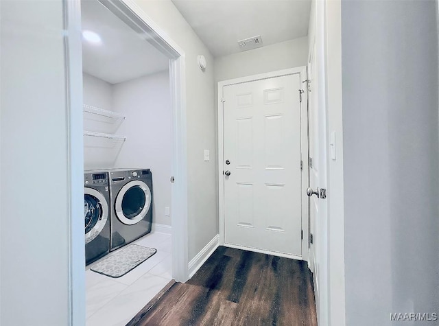 laundry room featuring independent washer and dryer