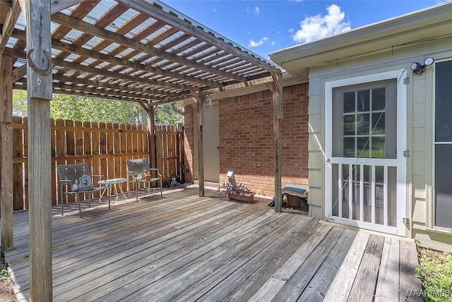 wooden terrace featuring a pergola