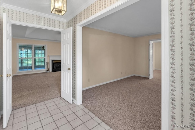 hallway featuring ornamental molding and light carpet