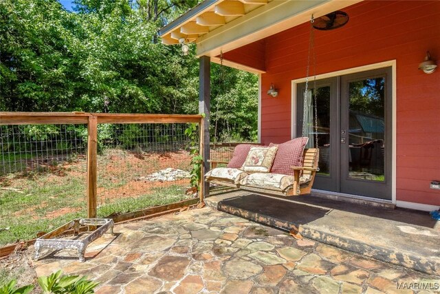 1086 Riverknolle Rd, Tallassee, AL 36078 - view of patio with french doors and fence