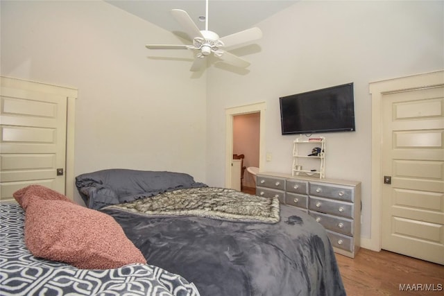 1086 Riverknolle Rd, Tallassee, AL 36078 - bedroom with ceiling fan, a high ceiling, and wood finished floors