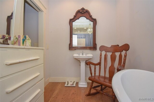 1086 Riverknolle Rd, Tallassee, AL 36078 - bathroom featuring baseboards and wood finished floors