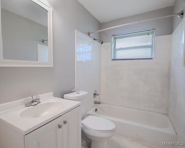 full bathroom featuring tub / shower combination, vanity, and toilet