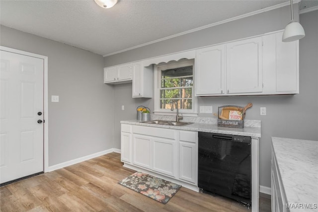 kitchen with white cabinetry, sink, black dishwasher, pendant lighting, and light wood-type flooring