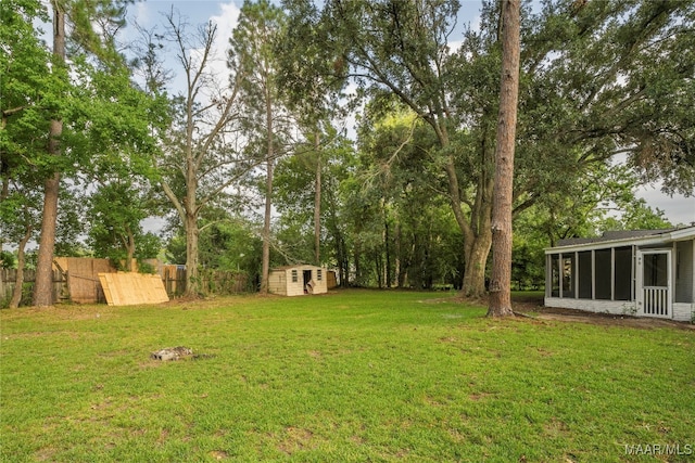 view of yard featuring a storage unit