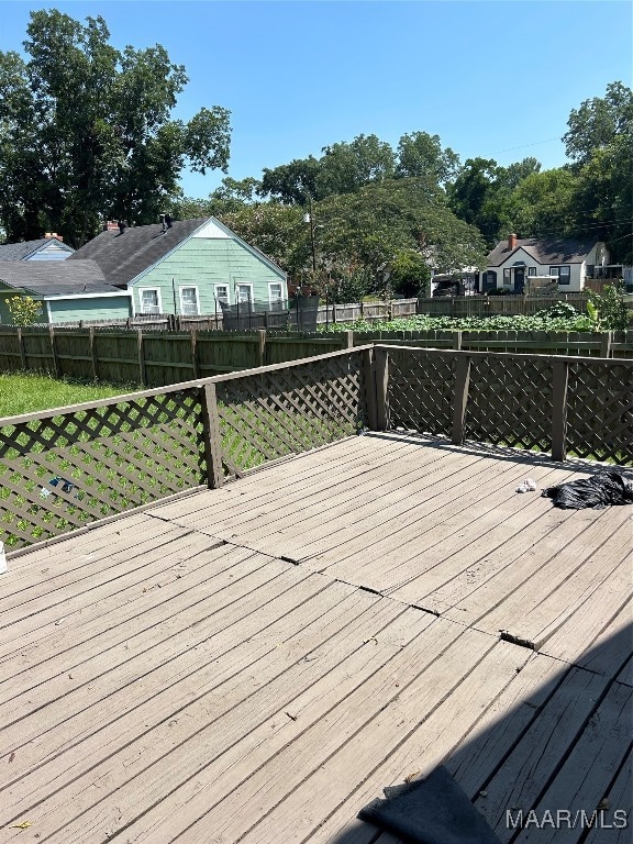 deck featuring a lawn