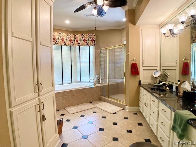 bathroom with ceiling fan, tile patterned floors, vanity, ornamental molding, and plus walk in shower