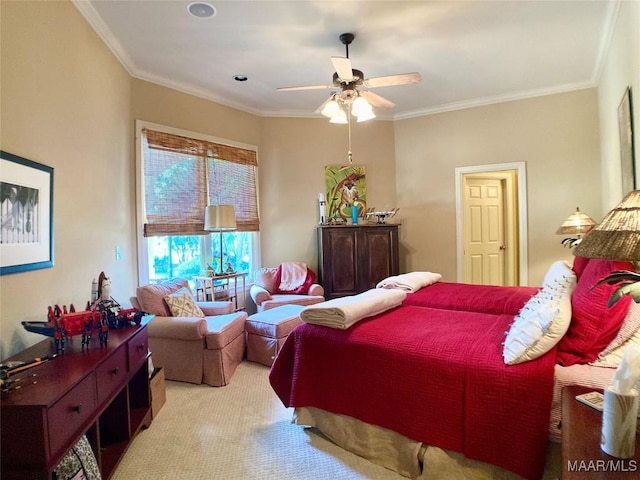 bedroom featuring ornamental molding, ceiling fan, and light carpet