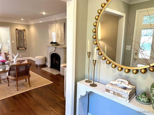 bathroom featuring ornamental molding and hardwood / wood-style flooring