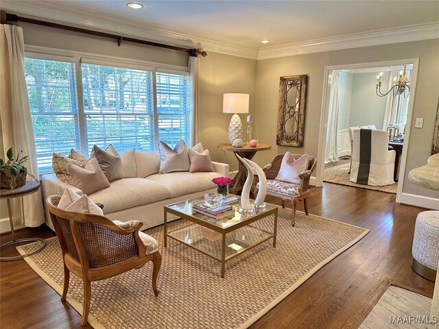 living room featuring ornamental molding, dark hardwood / wood-style floors, and a wealth of natural light