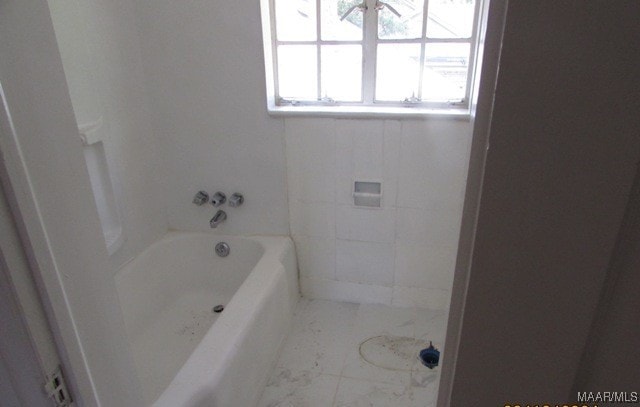 bathroom featuring tile patterned flooring